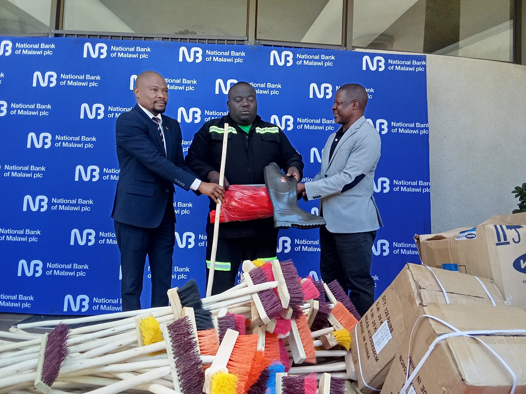 Mayor receiving donation from National Bank of Malawi